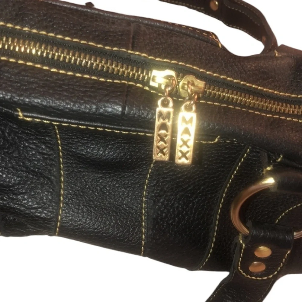 Maxx New York size medium large black leather brass detail perfect lining